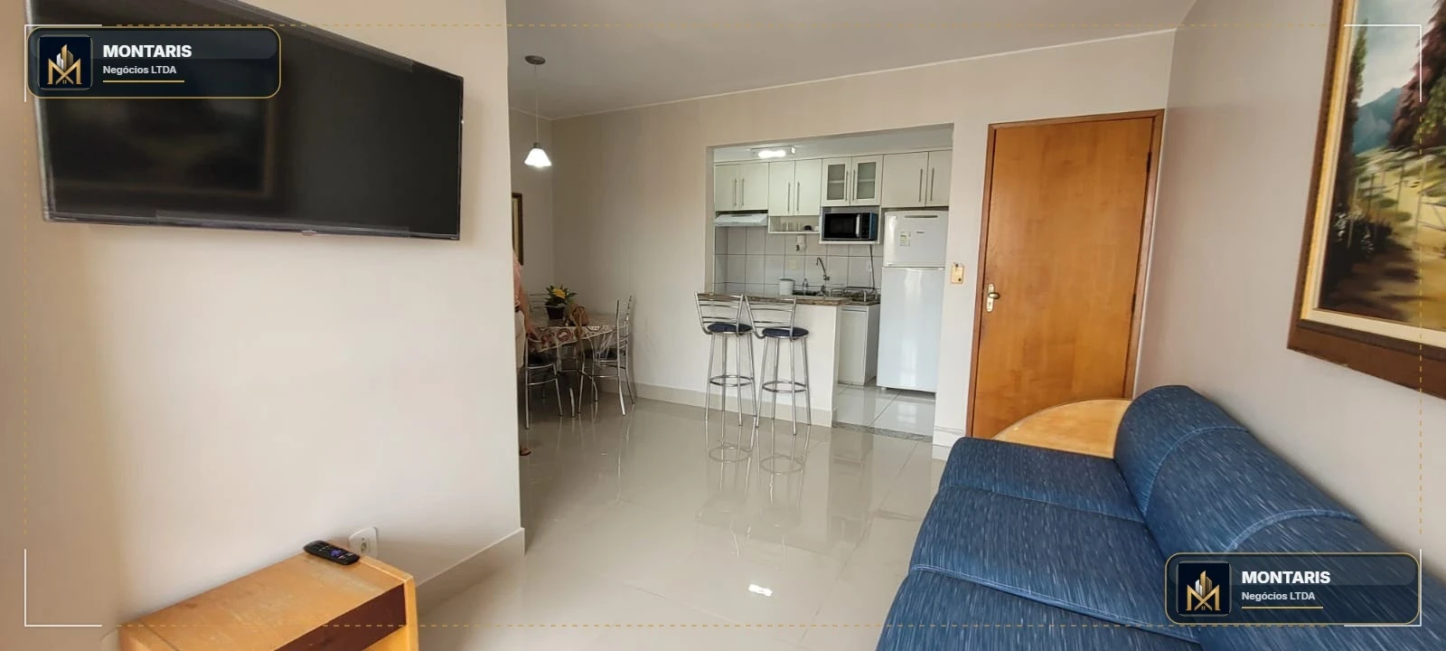 Sala e cozinha de apartamento mobiliado no Millennium Thermas Residence em Caldas Novas